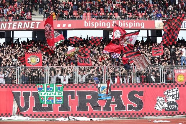 02 03 2024 Soccer Season 2023 2024 2 Soccer Bundesliga 24 Matchday 1 FC Nürnberg FCN Club BTSV Eintracht Braunschweig EBS Sportfoto Zink DaMa xdaxmax DFL regulations prohibit any use of photographs as image sequences and or quasi video only for editorial use Clubfan Clubfans FCN Fans Fans cheer team team behind high fences fence fence system higher than at the last matches