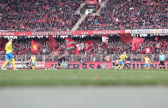 02 03 2024 Soccer Season 2023 2024 2 Soccer Bundesliga 24 Matchday 1 FC Nürnberg FCN Club BTSV Eintracht Braunschweig EBS Sportfoto Zink DaMa xdaxmax DFL regulations prohibit any use of photographs as image sequences and or quasi video only for editorial use Clubfan Clubfans FCN Fans Fans cheer on FCN Team Team Schwenkfahnen