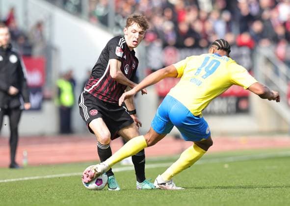 02 03 2024 Soccer Season 2023 2024 2 Soccer Bundesliga 24 Matchday 1 FC Nürnberg FCN Club BTSV Eintracht Braunschweig EBS Sportfoto Zink DaMa xdaxmax DFL regulations prohibit any use of photographs as image sequences and or quasi video only for editorial use Benjamin Goller 14, 1 FC Nürnberg FCN Anton Leander Donkor 19, Eintracht Braunschweig BTSV EBS