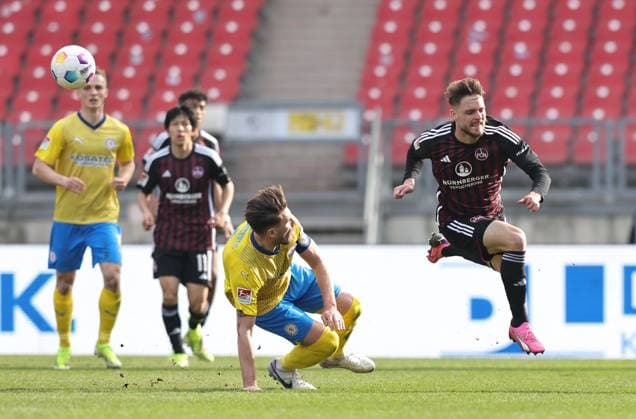 02 03 2024 Soccer Season 2023 2024 2 Soccer Bundesliga 24 Matchday 1 FC Nürnberg FCN Club BTSV Eintracht Braunschweig EBS Sportfoto Zink DaMa xdaxmax DFL regulations prohibit any use of photographs as image sequences and or quasi video only for editorial use Ermin Bicakcic 6, Eintracht Braunschweig BTSV EBS Lukas Schleimer 36, 1 FC Nürnberg FCN Foul