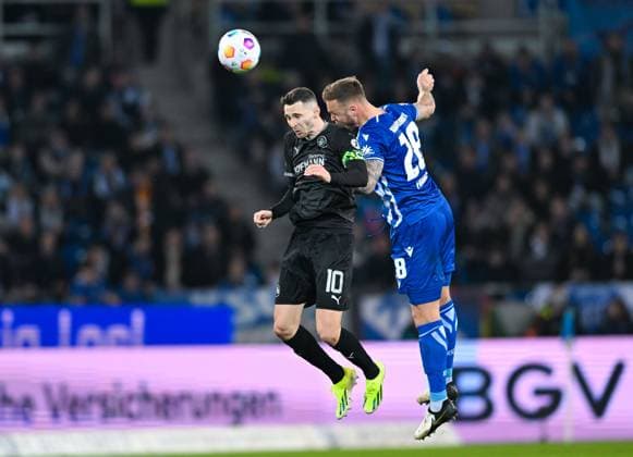 Germany, Karlsruhe, 02 03 2024, BBBank Wildpark, Karlsruher SC vs SpVgg Greuther Fuerth 2 Bundesliga, Branimir Hrgota SpVgg Greuther Fuerth and Marcel Franke Karlsruher SC battle for the ball Karlsruhe BBBank Wildpark Baden Wuerttemberg Germany eu-images-738