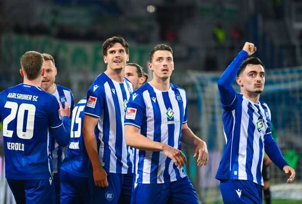 Germany, Karlsruhe, 02 03 2024, BBBank Wildpark, Karlsruher SC vs SpVgg Greuther Fuerth 2 Bundesliga, Igor Matanovic Karlsruher SC , Nicolai Rapp Karlsruher SC and Paul Nebel Karlsruher SC celebrate the first goal of their team Karlsruhe BBBank Wildpark Baden Wuerttemberg Germany eu-images-738