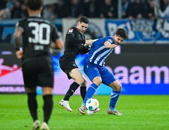 Germany, Karlsruhe, 02 03 2024, BBBank Wildpark, Karlsruher SC vs SpVgg Greuther Fuerth 2 Bundesliga, Igor Matanovic Karlsruher SC and Damian Michalski SpVgg Greuther Fuerth battle for the ball Karlsruhe BBBank Wildpark Baden Wuerttemberg Germany eu-images-738