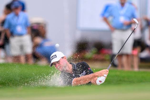 PALM BEACH GARDENS, FL - MARCH 02: Austin Eckroat of the United States hits the ball out of a bunker at the tenth hole during the third round of Cognizant Classic in The Palm Beaches at PGA, Golf Herren National Resort the Champion Course on March 2, 2024 in Palm Beach Gardens, Florida.(Photo by Doug Murray Icon Sportswire) GOLF: MAR 02 PGA Cognizant Classic in The Palm Beaches EDITORIAL USE ONLY Icon79620240302023