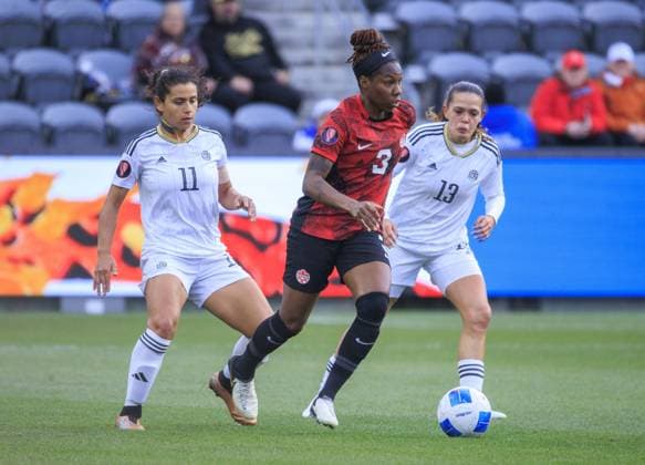 March 2, 2024, Los Angeles, California, USA: Kadeisha Buchanan 3 of Canada attempts to pass Raquel Rodriguez 11 and Emilie Valenciano 13 of Costa Rica during the 2024 Concacaf W Gold Cup Quarterfinal match on Saturday March 2, 2024 at BMO Stadium in Los Angeles, California. ARIANA RUIZ PI Los Angeles U.S - ZUMAp124 20240302_zaa_p124_013 Copyright: xArianaxRuizx