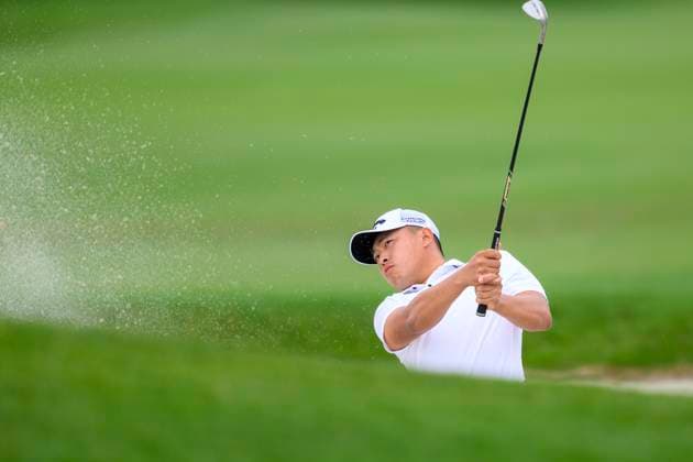 PALM BEACH GARDENS, FL - MARCH 02: Kevin Yu of Chinese Taipei hits his ball out of a bunker at the tenth hole during the third round of Cognizant Classic in The Palm Beaches at PGA, Golf Herren National Resort the Champion Course on March 2, 2024 in Palm Beach Gardens, Florida.(Photo by Doug Murray Icon Sportswire) GOLF: MAR 02 PGA Cognizant Classic in The Palm Beaches EDITORIAL USE ONLY Icon79620240302043
