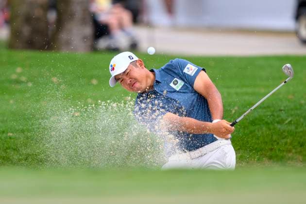 PALM BEACH GARDENS, FL - MARCH 02: Byeong Hun An of South Korea hits the ball out of a bunker at the tenth hole during the third round of Cognizant Classic in The Palm Beaches at PGA, Golf Herren National Resort the Champion Course on March 2, 2024 in Palm Beach Gardens, Florida.(Photo by Doug Murray Icon Sportswire) GOLF: MAR 02 PGA Cognizant Classic in The Palm Beaches EDITORIAL USE ONLY Icon79620240302080