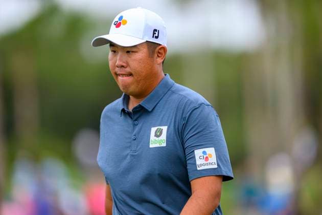 PALM BEACH GARDENS, FL - MARCH 02: Byeong Hun An of South Korea walks at the tenth hole during the third round of Cognizant Classic in The Palm Beaches at PGA, Golf Herren National Resort the Champion Course on March 2, 2024 in Palm Beach Gardens, Florida.(Photo by Doug Murray Icon Sportswire) GOLF: MAR 02 PGA Cognizant Classic in The Palm Beaches EDITORIAL USE ONLY Icon79620240302083