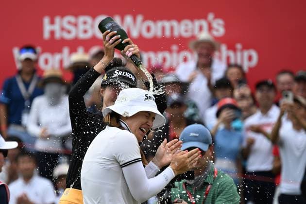 (240303) -- SINGAPORE, March 3, 2024 -- Hannah Green of Australia celebrates after winning the HSBC Women s World Championship, WM, Weltmeisterschaft held at the Singapore s Sentosa Golf Club on March 3, 2024. (Photo by Then Chih Wey Xinhua) (SP)SINGAPORE-GOLF-WOMEN S WORLD CHAMPIONSHIP XinxJiapo 