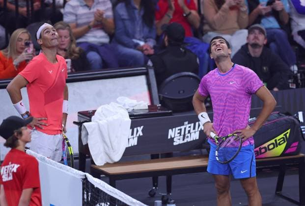 Rafael Nadal and Carlos Alcaraz of Spain look up at the giant screen Netflix Slam, Tennis, Michelob ULTRA Arena, Mandalay Bay Resort, Las Vegas, USA - 03 Mar 2024  Copyright: xEllaxLing Shutterstockx 14371999cc