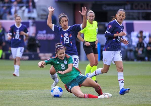 March 3, 2024, Los Angeles, California, USA: Rebeca Fernandez 19 of Paraguay commits a foul against Alexia Delgado 8 of Mexico during the 2024 Concacaf W Gold Cup Quarterfinal match on Sunday March 3, 2024 at BMO Stadium in Los Angeles, California. Mexico defeats Paraguay, 3-2. ARIANA RUIZ PI Los Angeles U.S - ZUMAp124 20240303_zaa_p124_021 Copyright: xArianaxRuizx
