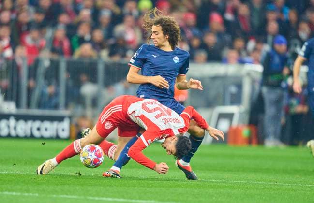 Matteo Guendouzi Olie, Lazio Rom Nr. 8 compete for the ball, tackling, duel, header, zweikampf, action, fight against Aleksandar Pavlovic, FCB 45 in the round of 16 match FC BAYERN MUENCHEN - LAZIO ROM of football UEFA Champions League in season 2023 2024 in Munich, Mar 5, 2024. Achtelfinale,, FCB, München