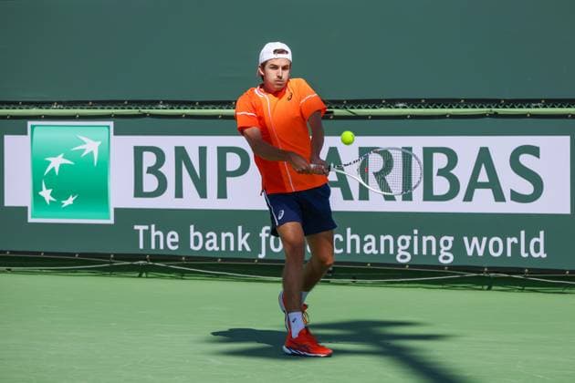 INDIAN WELLS, CA - MARCH 05: Zachary Svajda (USA) hits a backhand during the qualifying round for the BNP Paribas Open on March 5, 2024 at Indian Wells Tennis Garden in Indian Wells. CA. (Photo by George Walker Icon Sportswire) TENNIS: MAR 05 BNP Paribas Open EDITORIAL USE ONLY Icon240305007