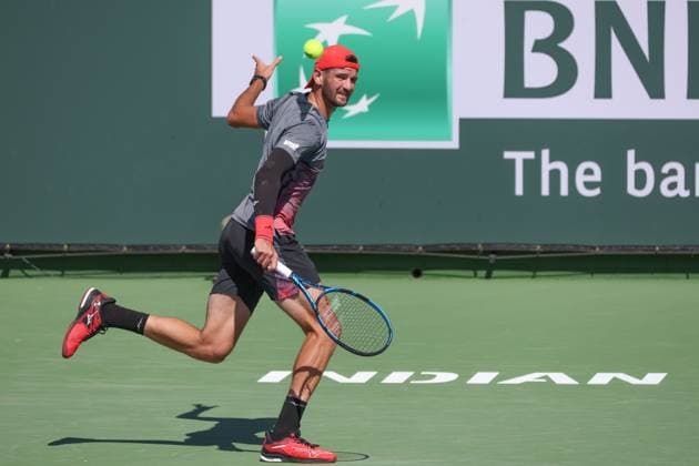 INDIAN WELLS, CA - MARCH 05: Andrea Vavassori (ITA) hits a backhand during the qualifying round for the BNP Paribas Open on March 5, 2024 at Indian Wells Tennis Garden in Indian Wells. CA. (Photo by George Walker Icon Sportswire) TENNIS: MAR 05 BNP Paribas Open EDITORIAL USE ONLY Icon240305025