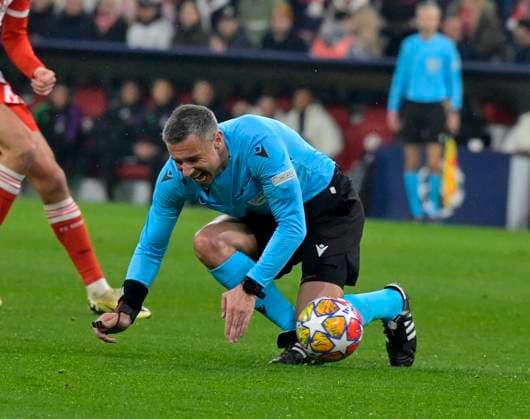 05 03 2024, Football UEFA Championsleague 2023 2024 Round of 16, FC Bayern Munich Lazio Roma, at Allianz Arena Munich Referee Slavko Vincic SVN stumbles DFL and DFB regulations prohibit any use of photographs as image sequences and or quasi video
