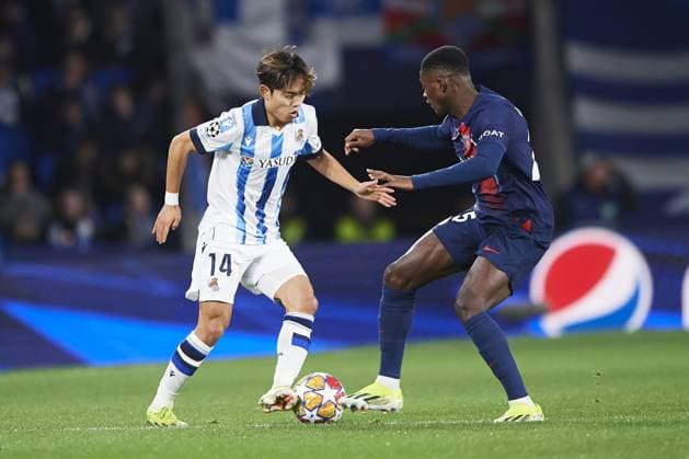 Takefusa Kubo of Real Sociedad dribbles during the UEFA Champions League match between Real Sociedad v Paris Saint Germain at Reale Arena on March 5, 2024 in San Sebastian (Photo by: LGM) FOOTBALL : Real Sociedad vs Paris Saint Germain - UEFA Ligue des Champions - 05 03 2024 LGM Panoramic 