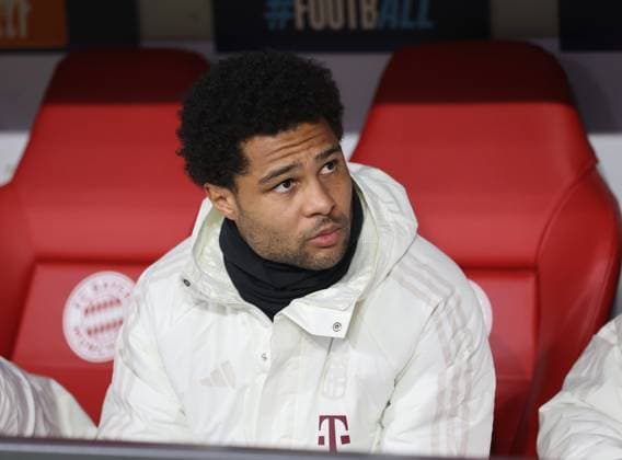Munich, Germany 05 March 2024 Football, Men, Champions League, Season 2023 2024, Round of 16 second leg, FC Bayern Munich Lazio Rome, Allianz Arena Serge Gnabry FC Bayern Munich sits on the substitutes bench