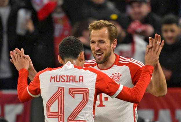 05 03 2024, Football UEFA Championsleague 2023 2024 Round of 16, FC Bayern Munich Lazio Rome, in the Allianz Arena Munich v l Jamal Musiala FC Bayern Munich and Harry Kane FC Bayern Munich cheer DFL and DFB regulations prohibit any use of photographs as image sequences and or quasi video