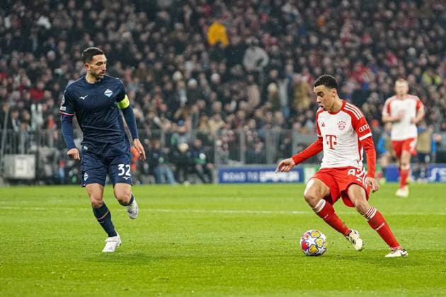 Danilo Cataldi 32 Lazio Rome and Jamal Musiala 42 FC Bayern in action during the Champions League match FC Bayern Munich Lazio Rome on 05 03 2024 Munich Allianz Arena Bayern Germany