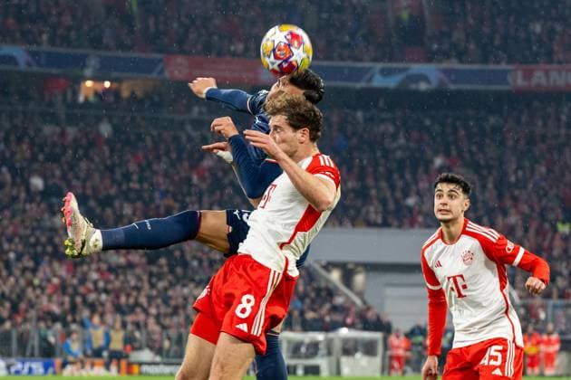 Header Alessio Romagnoli 13 S S Lazio Rome , Leon Goretzka 8 FC Bayern Muenchen , Aleksandar Pavlovic 45 FC Bayern Muenchen beisst die Zaehne zusammen, FC Bayern Muenchen vs Lazio Rome, Fußball, UEFA Champions League Achtelfinale Rueckspiel, 05 03 2024 DFB regulations prohibit any use of photographs as image sequences and or quasi video Muenchen Bayern Germany Copyright: xkolbert-press UlrichxGamelx
