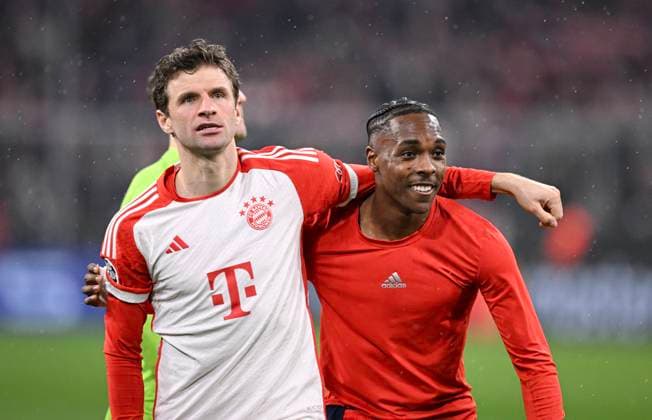 FOOTBALL CHAMPIONS LEAGUE SEASON 2023 2024 Round of 16 second leg 05 03 2024 FC Bayern Muenchen Lazio Rome FINAL CELEBRATION FC Bayern Muenchen Thomas Mueller left hugs Mathys Tel
