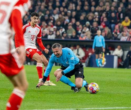 05 03 2024, Football UEFA Championsleague 2023 2024 Round of 16, FC Bayern Munich Lazio Roma, at Allianz Arena Munich Referee Slavko Vincic SVN has just been sent off and hit by the ball DFL and DFB regulations prohibit any use of photographs as image sequences and or quasi video