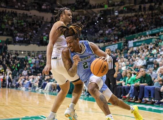 March 5, 2024, Tampa, Florida, USA: Tulane Green Wave forward GREGG GLENN III (2) drives to the basket during the NCAA, College League, USA men s basketball game between the Tulane Green Wave and University of South Florida Bulls at the Yuengling Center in Tampa, Florida. Tampa USA - ZUMAa220 20240305_znp_a220_017 Copyright: xIsraelxAntax