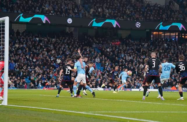 MANCHESTER, ENGLAND, 6th March 2024. Manuel Akanji of Manchester City scores to make it 1-0 during the UEFA Champions League match at the Etihad Stadium, MANCHESTER. Picture credit should read: Andrew Yates Sportimage EDITORIAL USE ONLY. No use with unauthorised audio, video, data, fixture lists, club league logos or live services. Online in-match use limited to 120 images, no video emulation. No use in betting, games or single club league player publications. SPI-2988-0026