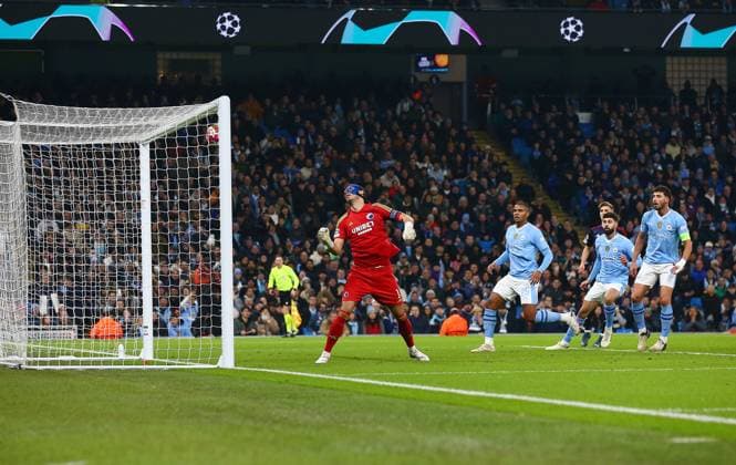 Kamil Grabara of FC Kobenhavn spills the ball into the net after a shot from Julian Ãlvarez of Manchester City who scores to make it 2-0 Manchester City v FC Copenhagen, UEFA Champions League, Round of 16, Second Leg, Football, Etihad Stadium, Manchester, UK - 06 Mar 2024 EDITORIAL USE ONLY No use with unauthorised audio, video, data, fixture lists, club league logos or live services. Online in-match use limited to 120 images, no video emulation. No use in betting, games or single club league player publications. Copyright: xMattxWest Shutterstockx 14373648ab