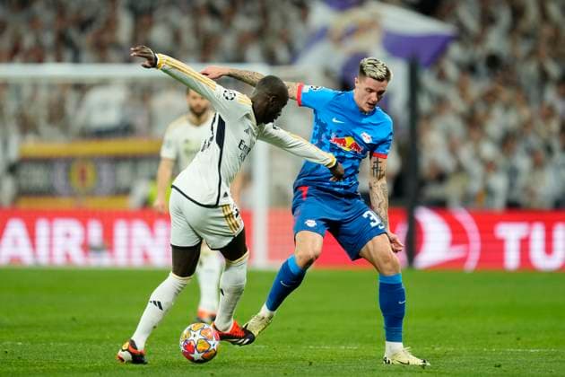 Real Madrid CF v RB Leipzig: Round of 16 Second Leg - UEFA Champions League 2023 24 Ferland Mendy left-back of Real Madrid and France and Benjamin Sesko Centre-Forward of RB Leipzig and Slovenia compete for the ball during the UEFA Champions League 2023 24 round of 16 second leg match between Real Madrid CF and RB Leipzig at Estadio Santiago Bernabeu on March 6, 2024 in Madrid, Spain. Madrid Spain  Copyright: xJosexBretonx originalFilename:breton-realmadr240306_npsgD.jpg