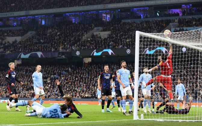6th March 2024; Etihad Stadium, Manchester, England; Champions League Football, Round of 16, Manchester City versus Copenhagen; FC Copenhagen goalkeeper Kamil Grabara tips the ball over the crossbar  ActionPlus12615740 DavidxBlunsden