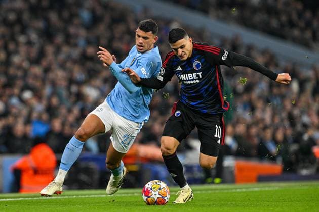 UEFA Champions League Manchester City v F.C. Copenhagen Matheus Nunes of Manchester City and Mohamed Elyounoussi of FC Copenhagen battle for the ball during the UEFA Champions League match Manchester City vs F.C. Copenhagen at Etihad Stadium, Manchester, United Kingdom, 6th March 2024 (Photo by Cody Froggatt News Images) Copyright: xCodyxFroggatt NewsxImagesx