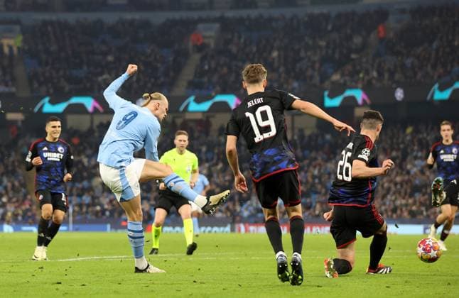 6th March 2024; Etihad Stadium, Manchester, England; Champions League Football, Round of 16, Manchester City versus Copenhagen; Erling Haaland of Manchester City shoots and scores with a left footed shot for 3-1 after 3 added minutes at the end of the first half  ActionPlus12615752 DavidxBlunsden