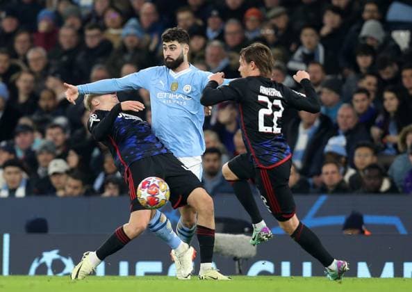 6th March 2024; Etihad Stadium, Manchester, England; Champions League Football, Round of 16, Manchester City versus Copenhagen; Josko Gvardiol of Manchester City competes for the ball with Victor Froholdt and Peter Ankersen of FC Copenhagen  ActionPlus12615753 DavidxBlunsden