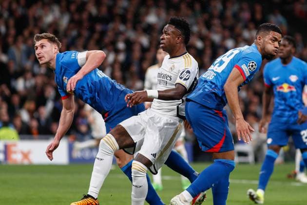 March 6, 2024: Willi Orban of RB Leipzig, Vinicius Junior of Real Madrid and Benjamin Henrichs of RB Leipzig in action during the UEFA CHampions League, Round of 16, football match played between Real Madrid and RB Leipzig at Santiago Bernabeu stadium on March 06, 2024, in Madrid, Spain. - ZUMAa181 20240306_zaa_a181_043 Copyright: xIrinaxR.xHipolitox
