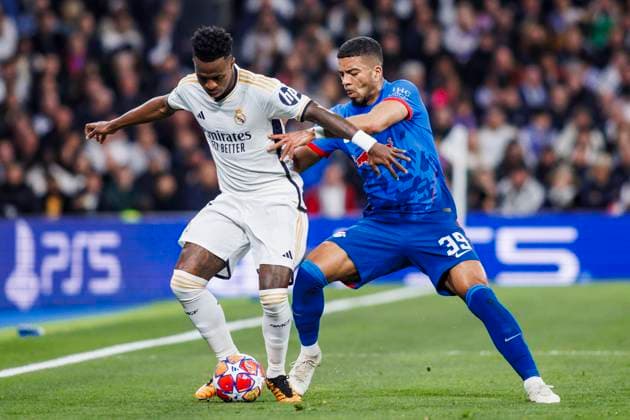 March 6, 2024, Madrid, Spain: Vinicius Junior of Real Madrid CF battles for the ball with Benjamin Henrichs of RB Leipzig during the Champions League match between Real Madrid and RB Leipzig at Santiago Bernabeu Stadium on March 6, 2024 in Madrid, Spain. Madrid Spain - ZUMAd159 20240306_zia_d159_012 Copyright: xMaxDexGraciaxJimenezx
