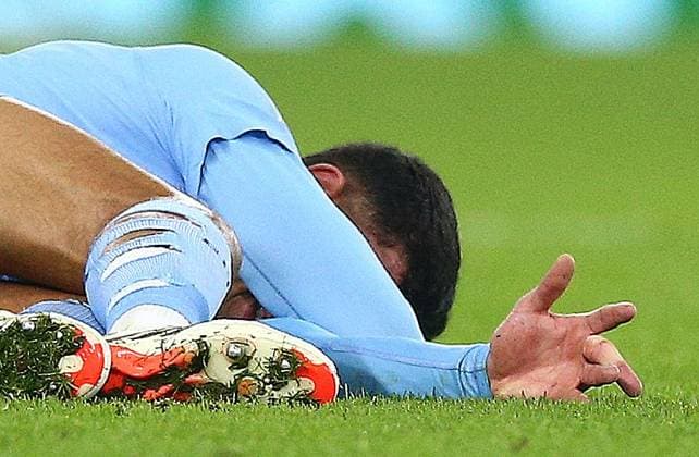 Matheus Nunes of Manchester City injures his finger during play Manchester City v FC Copenhagen, UEFA Champions League, Round of 16, Second Leg, Football, Etihad Stadium, Manchester, UK - 06 Mar 2024 EDITORIAL USE ONLY No use with unauthorised audio, video, data, fixture lists, club league logos or live services. Online in-match use limited to 120 images, no video emulation. No use in betting, games or single club league player publications. Copyright: xMattxWest Shutterstockx 14373648aw