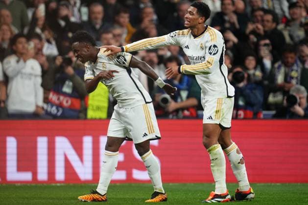 Vinicius Jr of Real Madrid celebrates the 1-0 with Jude Bellingham Real Madrid v RB Leipzig. UEFA Champions League match. Round of 16.. Football, Santiago Bernabeu Stadium, Madrid, Spain - 6 March 2024 Editorial use only  Copyright: xBaguxBlanco PRESSINPHOTO Shutterstockx 14379559ap