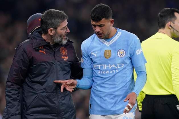 MANCHESTER, ENGLAND, 6th March 2024. Matheus Nunes of Manchester City leaves the pitch after he suffers a dislocated finger during the UEFA Champions League match at the Etihad Stadium, MANCHESTER. Picture credit should read: Andrew Yates Sportimage EDITORIAL USE ONLY. No use with unauthorised audio, video, data, fixture lists, club league logos or live services. Online in-match use limited to 120 images, no video emulation. No use in betting, games or single club league player publications. SPI-2988-0066
