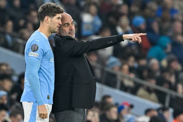 UEFA Champions League Manchester City v F.C. Copenhagen Pep Guardiola manager of Manchester City gives instructions to John Stones of Manchester City during the UEFA Champions League match Manchester City vs F.C. Copenhagen at Etihad Stadium, Manchester, United Kingdom, 6th March 2024 (Photo by Cody Froggatt News Images) Copyright: xCodyxFroggatt NewsxImagesx