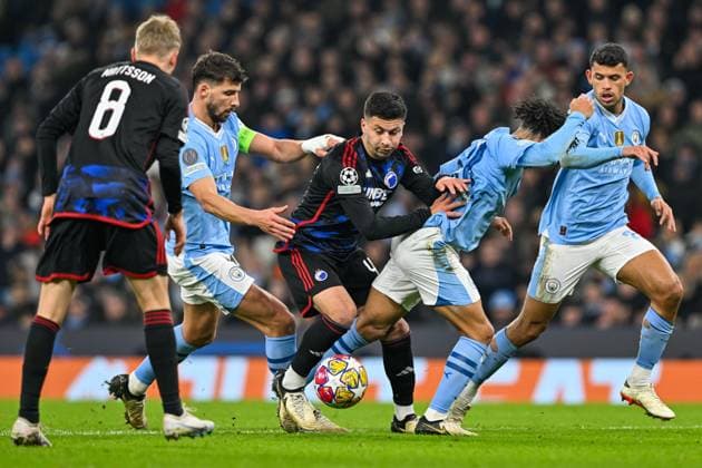UEFA Champions League Manchester City v F.C. Copenhagen Roony Bardghji of FC Copenhagen breaks past Rico Lewis of Manchester City and Ruben Dias of Manchester City during the UEFA Champions League match Manchester City vs F.C. Copenhagen at Etihad Stadium, Manchester, United Kingdom, 6th March 2024 (Photo by Cody Froggatt News Images) Copyright: xCodyxFroggatt NewsxImagesx