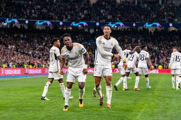 Uefa Champions League: Real Madrid vs RB Leipzig; Round of 16 Second Leg Vinicius Junior of Real Madrid (L) celebrate his goal with Jude Bellingham of Real Madrid (R) during the UEFA Champions League 2023 24 round of 16 second leg match between Real Madrid CF and RB Leipzig at Estadio Santiago Bernabeu on March 6, 2024 in Madrid, Spain. Madrid Estadio Santiago Bernabeu Spain Copyright: xAlbertoxGardinx AGardin_20240306_football_ChampionsLeague_Real_Madrid_vs_RB_Leipzig_14
