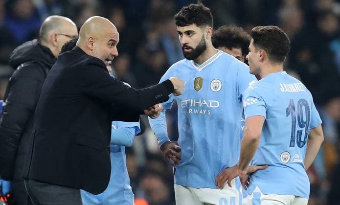 6th March 2024; Etihad Stadium, Manchester, England; Champions League Football, Round of 16, Manchester City versus Copenhagen; Manchester City manager Pep Guardiola issues instructions to Josko Gvardiol and Julian Alvarez of Manchester City  ActionPlus12615839 DavidxBlunsden