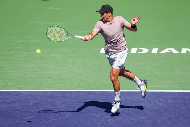 INDIAN WELLS, CA - MARCH 06: Marcos Giron (USA) hits a forehand during the BNP Paribas Open on March 6, 2024 at Indian Wells Tennis Garden in Indian Wells. CA. (Photo by George Walker Icon Sportswire) TENNIS: MAR 06 BNP Paribas Open EDITORIAL USE ONLY Icon240306012