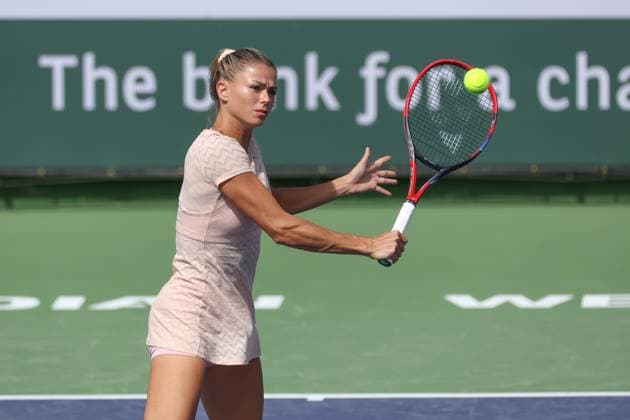 INDIAN WELLS, CA - MARCH 06: Camila Giorgi (ITA) hits a volley during the BNP Paribas Open on March 6, 2024 at Indian Wells Tennis Garden in Indian Wells. CA. (Photo by George Walker Icon Sportswire) TENNIS: MAR 06 BNP Paribas Open EDITORIAL USE ONLY Icon240306025