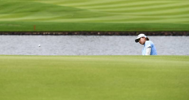 (240307) -- LINGSHUI, March 7, 2024 -- Saigo Mao of Japan hits from the bunker during the first round of the Blue Bay LPGA, Golf Damen golf tournament in Lingshui, south China s Hainan Province, March 7, 2024. ) (SP)CHINA-HAINAN-LINGSHUI-GOLF-BLUE BAY LPGA (CN) YangxGuanyu 