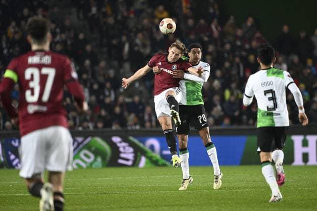 From left Jan Kuchta of Sparta and Jarell Quansah of Liverpool in action during the Europa League semifinal opening match: Sparta vs Liverpool in Prague, Czech Republic, March 7, 2024. (CTKxPhoto OndrejxDeml) CTKPhotoP2024030708647  CTKPhotoP2024030708647