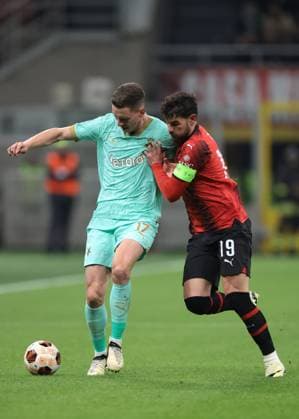 Milan, Italy, 7th March 2024. Theo Hernandez of AC Milan tussles with Lukas Provod of Slavic Praha the UEFA Europa League match at Giuseppe Meazza, Milan. Picture credit should read: Jonathan Moscrop Sportimage EDITORIAL USE ONLY. No use with unauthorised audio, video, data, fixture lists, club league logos or live services. Online in-match use limited to 120 images, no video emulation. No use in betting, games or single club league player publications. SPI-2971-0010