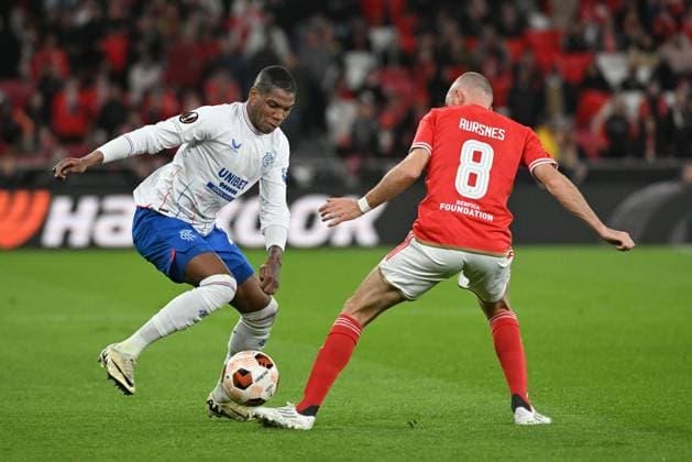 Dujon Sterling of Rangers and Fredrik Aursnes of Benfica Benfica v Rangers, UEFA Europa League, Round of 16, First Leg, Football, Estadio da Luz, Lisbon, Portugal - 07 Mar 2024 EDITORIAL USE ONLY No use with unauthorised audio, video, data, fixture lists, club league logos or live services. Online in-match use limited to 120 images, no video emulation. No use in betting, games or single club league player publications. Copyright: xZedxJameson Shutterstockx 14373669ap