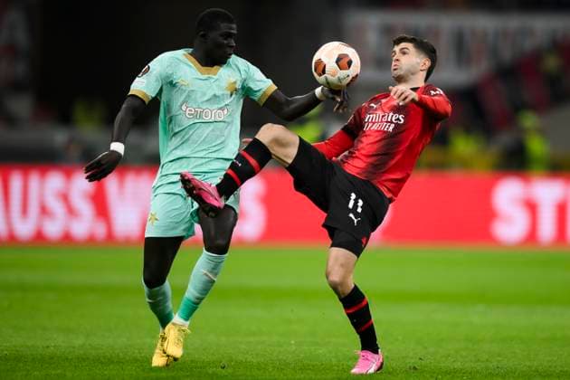 AC Milan v SK Slavia Praha - UEFA Europa League Christian Pulisic of AC Milan competes for the ball with El Hadji Malick Diouf of SK Slavia Praha during the UEFA Europa League round of 16 first leg football match between AC Milan and SK Slavia Praha. Milan Italy Copyright: xNicolòxCampox